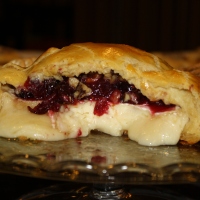 Brie En Croute with Cranberries and Walnuts